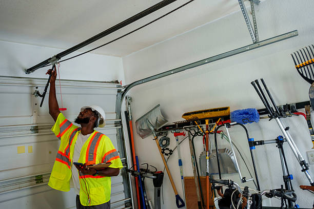 Professional Garage Door Panel Replacement technician working in Morgantown, MS